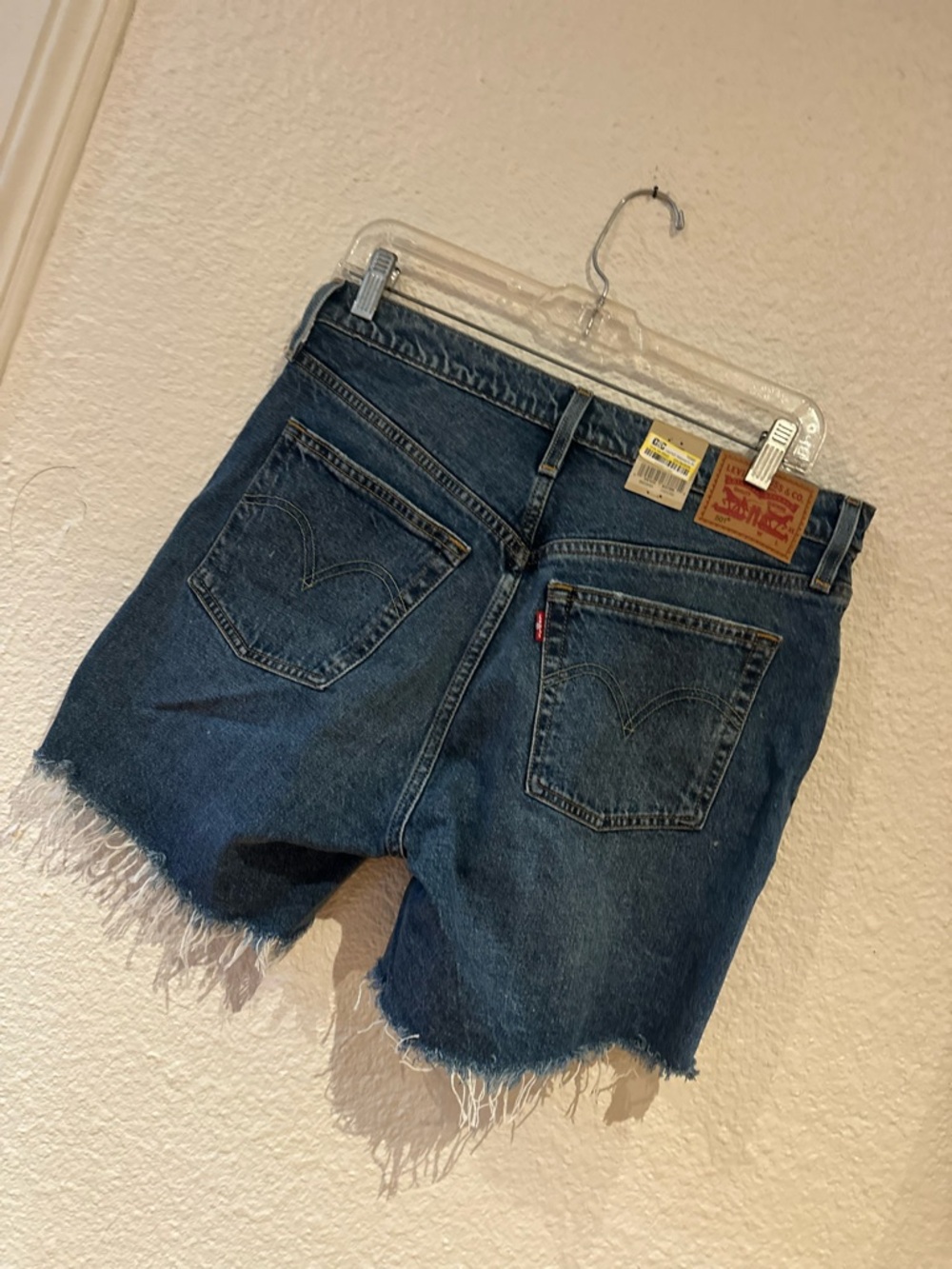 Levi's Denim Cutoff Jean Shorts in Medium Blue Wash mid thigh style (30) - Picture 5 of 5